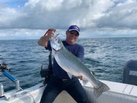 Tim with a giant Lake Ontario Steelhead