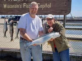 Another happy customer with a nice Rainbow Trout.