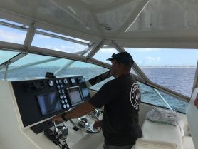 Capt Brad at the Helm of Wahooter's