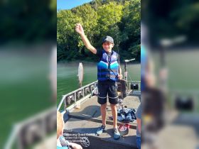 Youngster putting it on the trout.