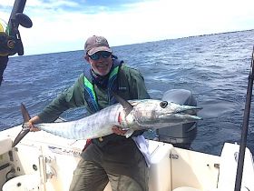 Capt. Willie with a wahoo caught on a live sardine in July.