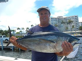 Eddie with a 23-pound blackfin tuna.