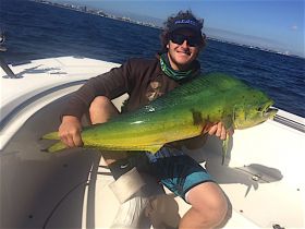 Alex caught this 32-inch dolphin on a live blue runner in about 120 feet off Palm Beach.