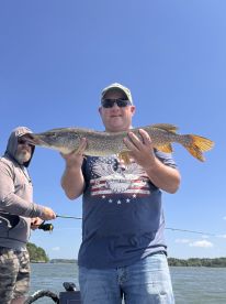 25mph wind 94 degree heat lots of fish 