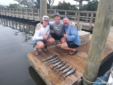 Kyle and his sons with a nice mixed bag.