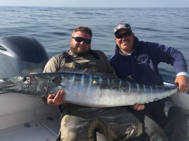 Shawn & I celebrating the first Wahoo of the day.