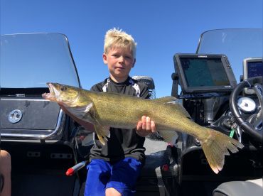 Landon with a Green Bay Trophy Walleye