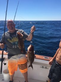 Pulling up 2 scamp grouper at a time!