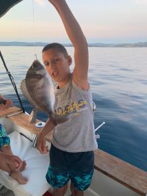 HIS FIRST FISH !