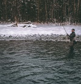 Fishing on the Kenai River in winter Solitude.