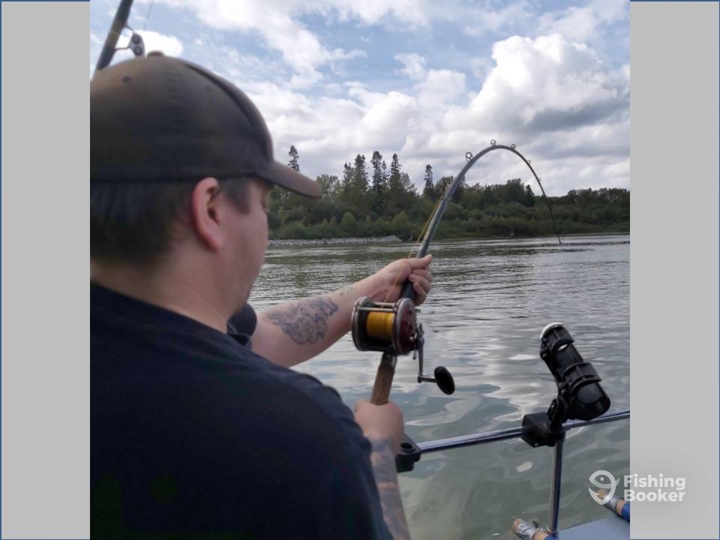 Bob feels the bend in the rod with his 1st fish
