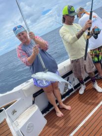 Gloria, calbrett with first sailfish.