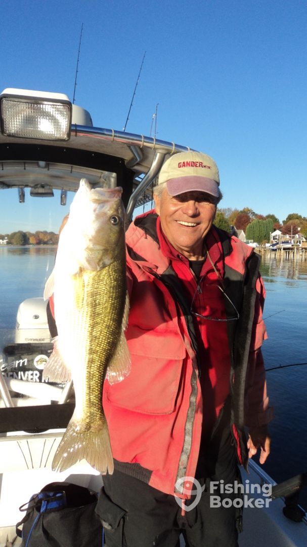 Capt. Gus holds a Lake Norman Spotted Bass