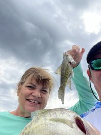 A Lady and her crappie fishing.