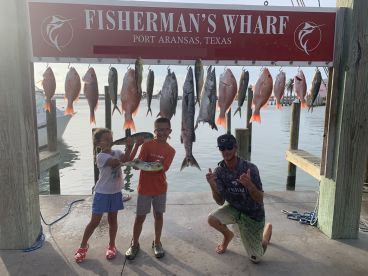 Hunter and Andrew can put fish in the boat!