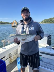 Best Fishing Charter Experience \u2013 Keeper Stripers and Spotless Boat!
