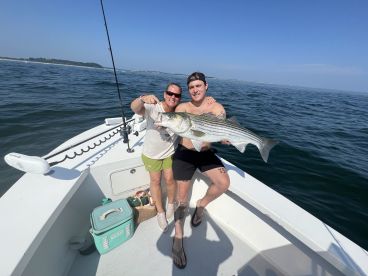 Captain Erik finds the fish!!!  Huge Stripers…