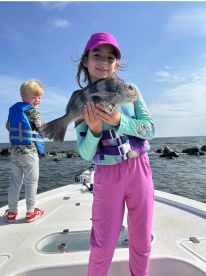 CATCHING FISH .  STAYING DRY. 