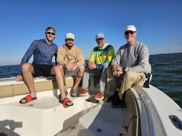 Four Fellows Caught Four Big Bull Reds